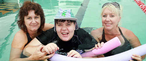 Carers Sharon White, left, and Sam Moore, right, assist Tahlia Hardwick with her aqua therapy. Tahlia holds a Companion Card which allows one of her carers free entry to the Hervey Bay Aquatic Centre. Carers Sharon White, left, and Sam Moore, right, assist Tahlia Hardwick with her aqua therapy. Tahlia holds a Companion Card which allows one of her carers free entry to the Hervey Bay Aquatic Centre.